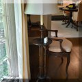 DL06. Turned wood floor lamp with table surface. 54”h 